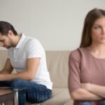 Sad depressed husband offended wife in quarrel, feeling guilty f